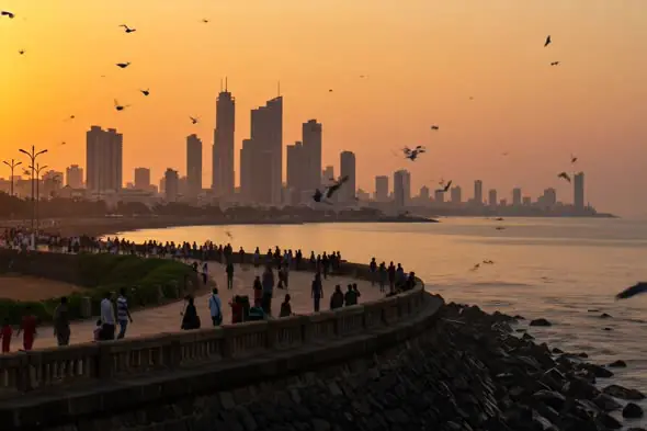 Crowds Walking at Marine Drive Curve Mumbai During Vibrant Sunset