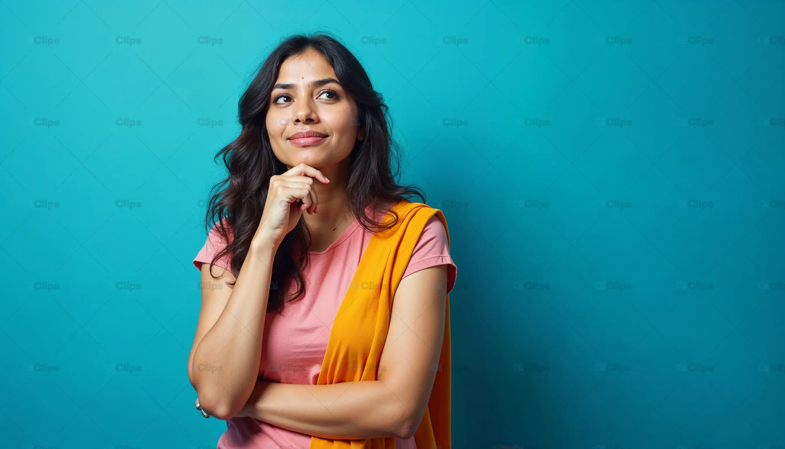 Thoughtful Woman in Pink and Orange
