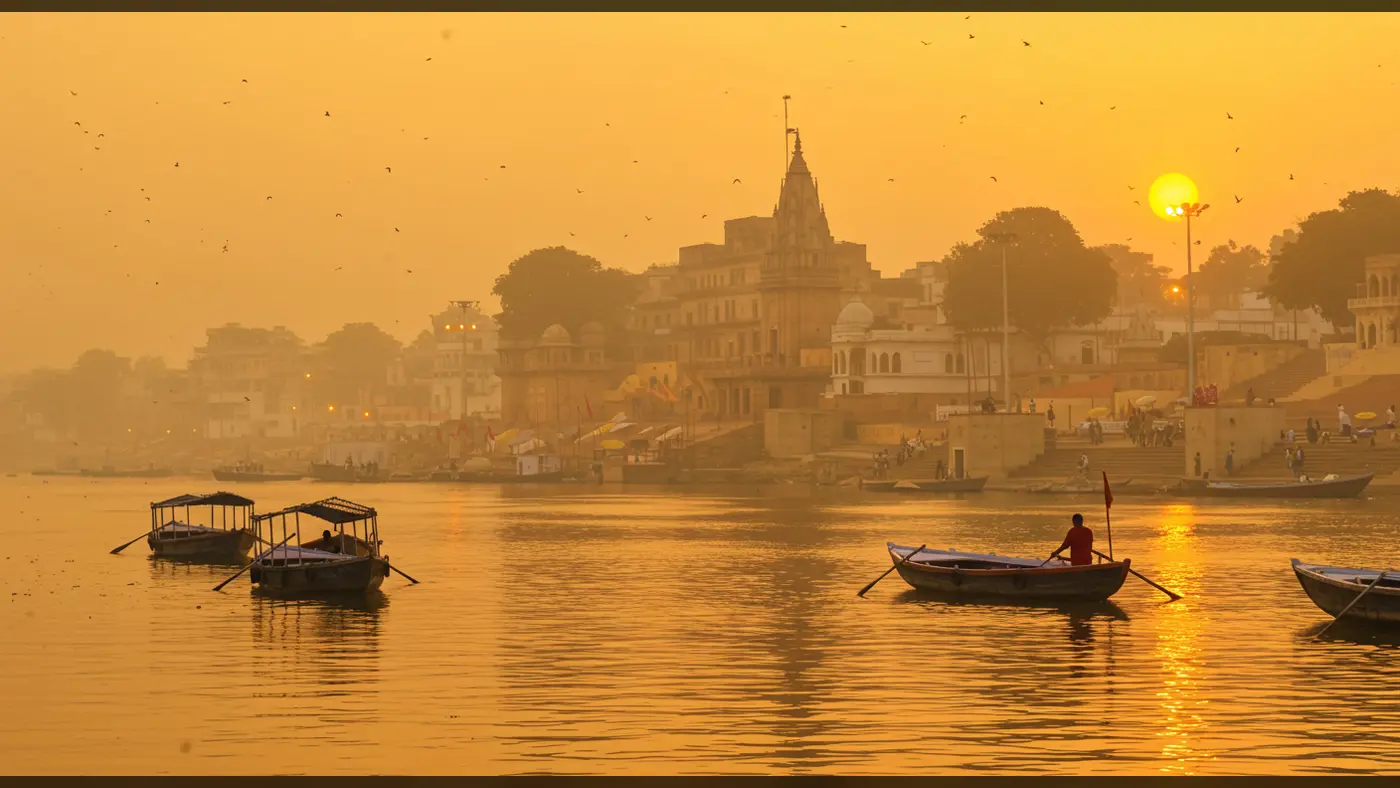 Sunrise over Varanasi Ghats with Boats on the Ganges River