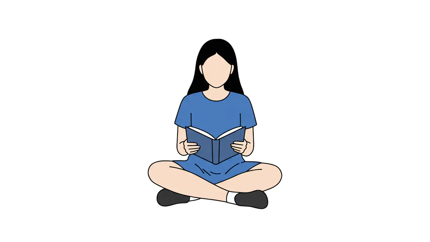 Cross-Legged Reading Figure