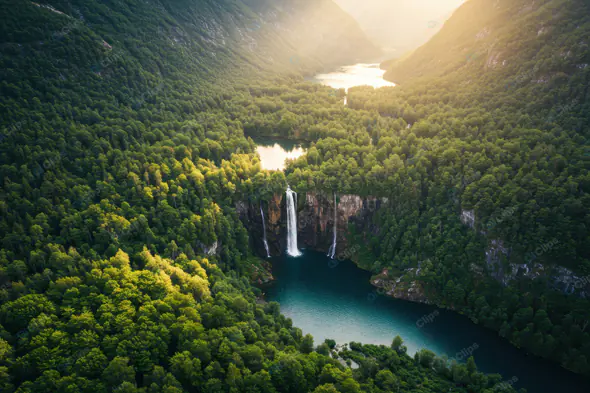 Sunlit Mountain Waterfall Oasis