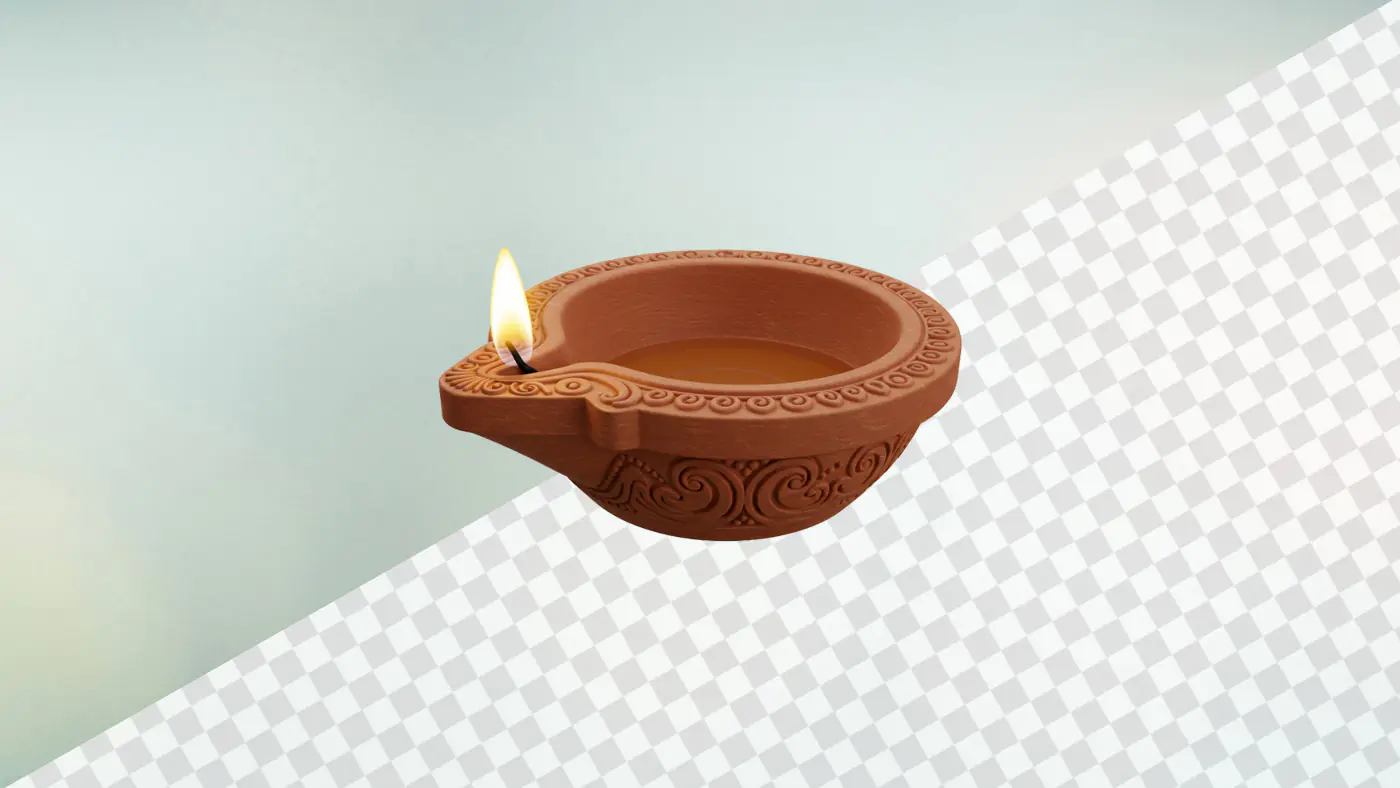 Terracotta diya lamp with ornate swirl patterns