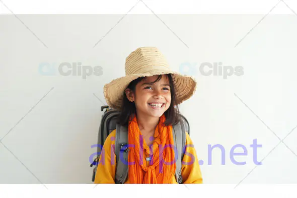 Happy Little Traveler Girl with Hat and Backpack