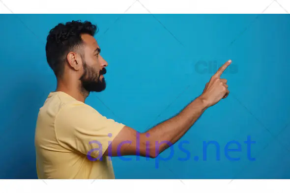 Side Profile Man Pointing Right in Yellow Shirt