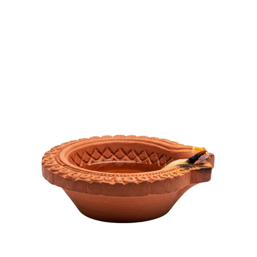 Traditional Terracotta Oil Lamp with Decorative Rim PNG