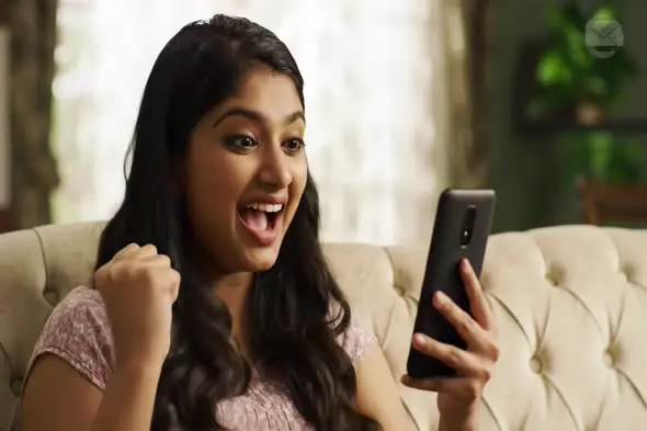Exuberant Smartphone User's Triumph