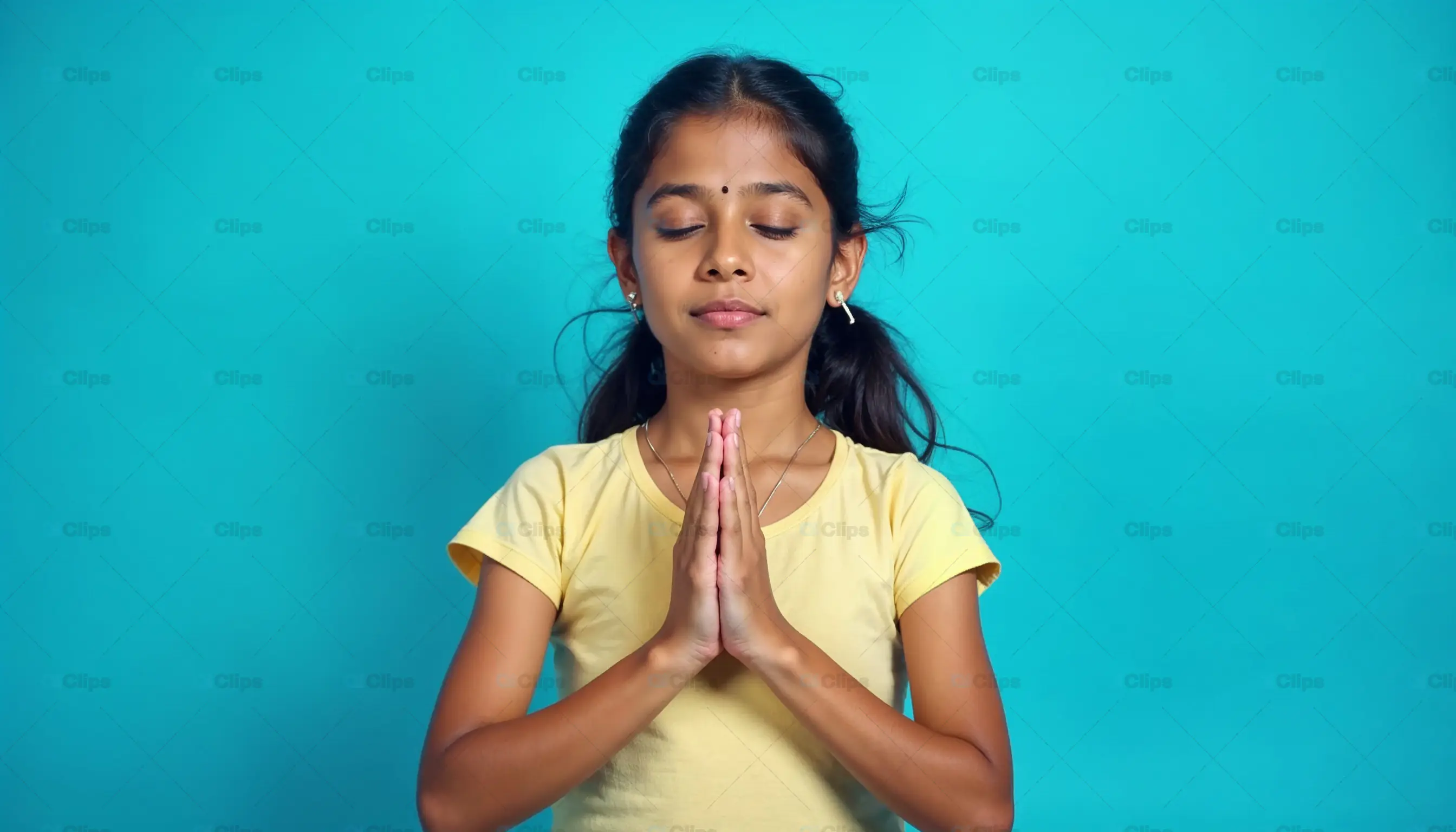 Peaceful Girl in Prayer Pose