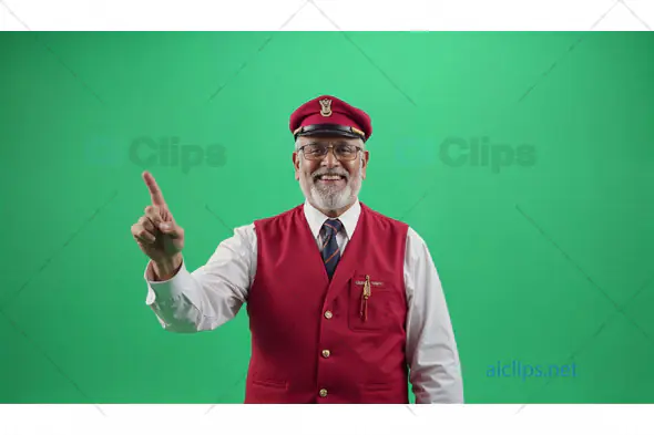 Senior Male Attendant in Red Uniform Pointing Up