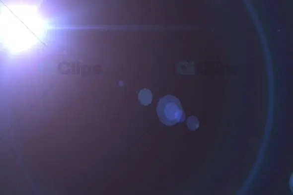 Bright Lens Flare Effect with Circular Bokeh on Dark Background