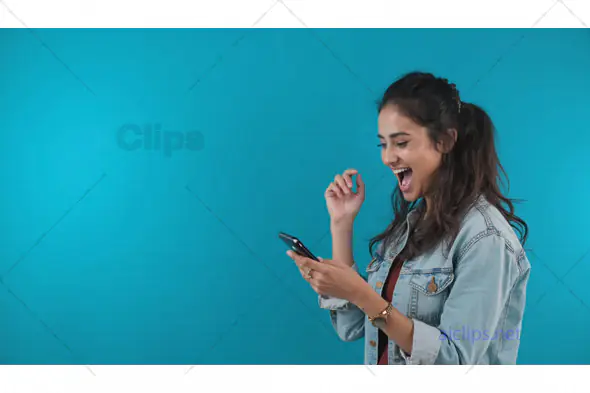 Excited Woman Using Smartphone