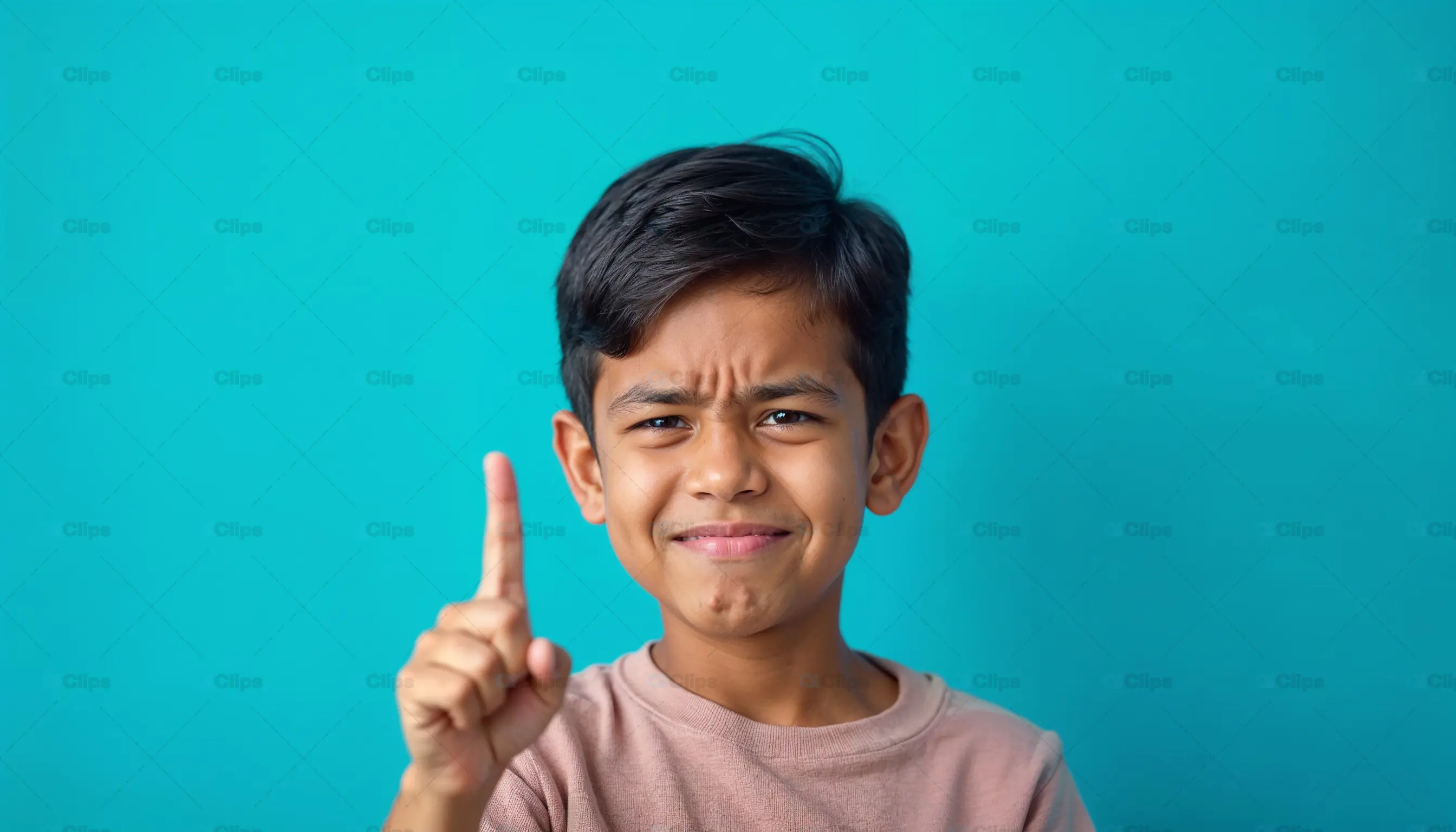 Serious Boy Pointing Up