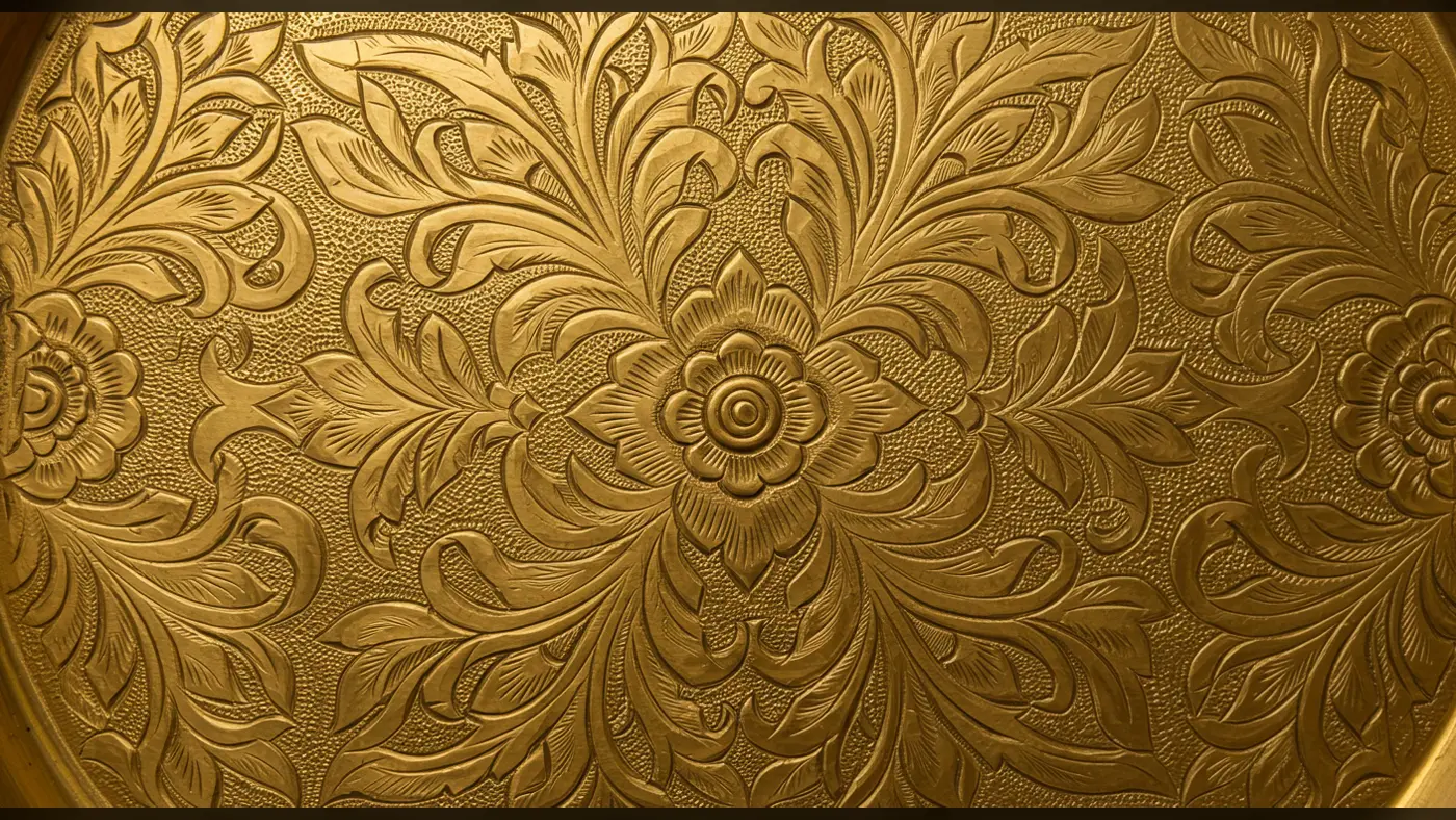 Engraved Floral Gold Texture Background | Ornate Metal Surface Design