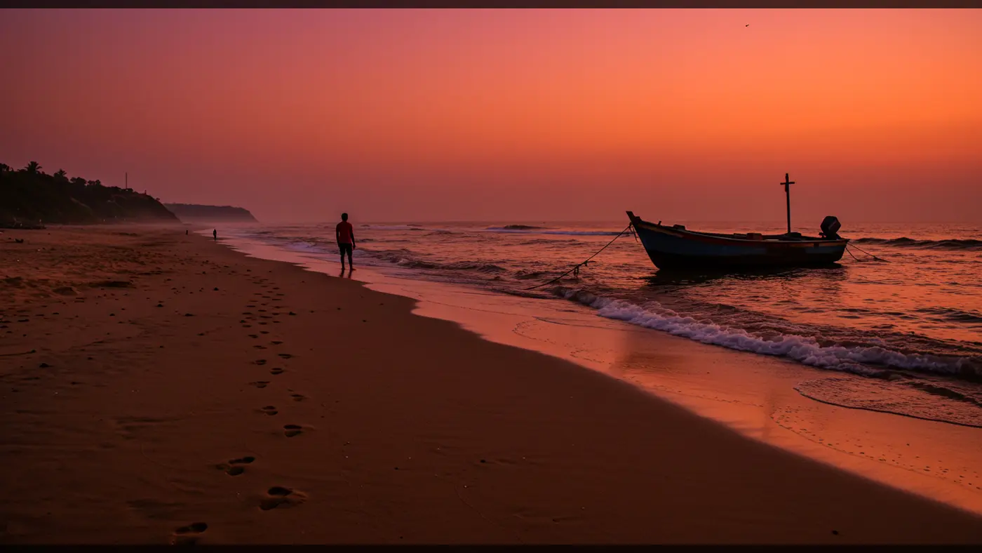 Indian Man Walking on the Beach at Sunset with Traditional Fishing Boat – Serene Coastal Landscape