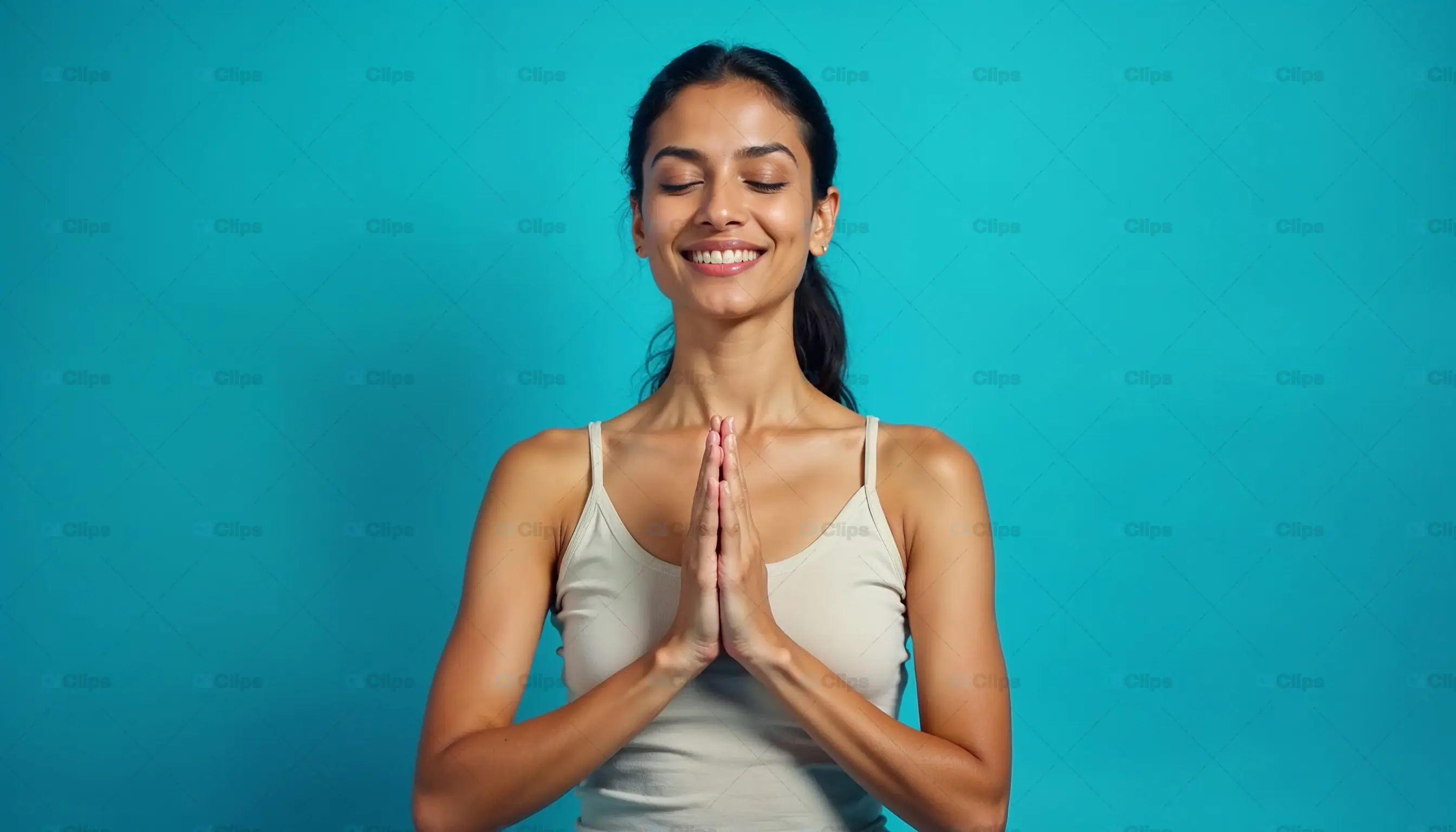 Smiling Woman in Prayer Pose 1