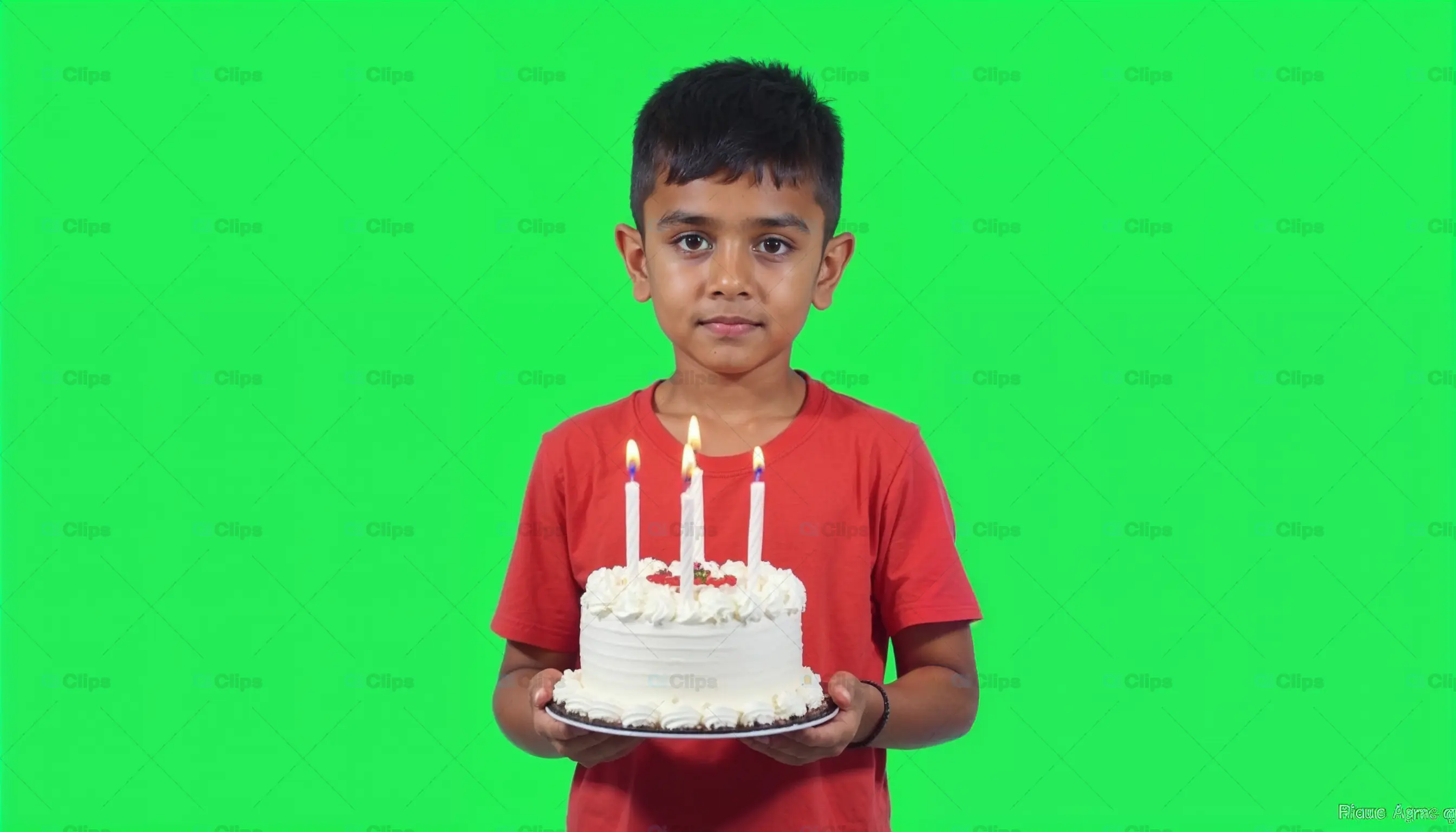 Young Boy Holding Birthday Cake with Candles