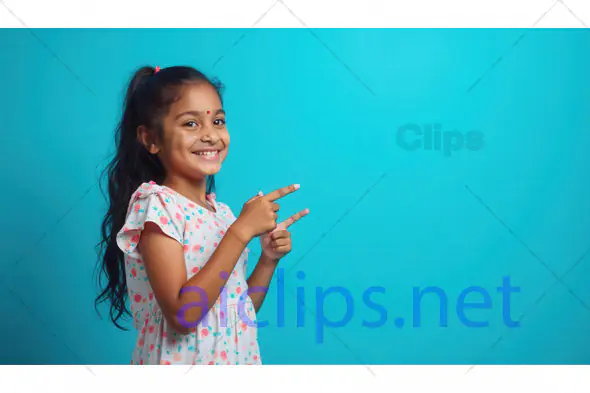 Smiling Girl Pointing with Double Finger Gesture on Blue Background