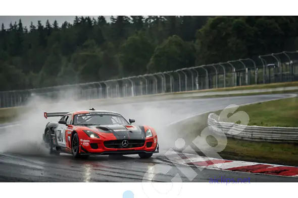 Red Mercedes Race Car on Wet Track