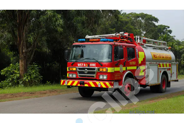Red Fire Truck on Patrol in Rural Area