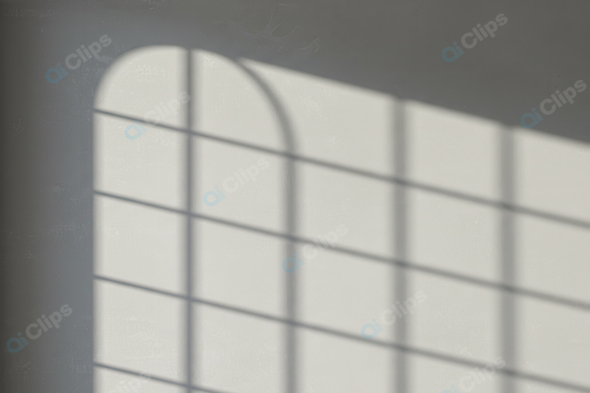 Sunlit Window Grid Shadow on Wall
