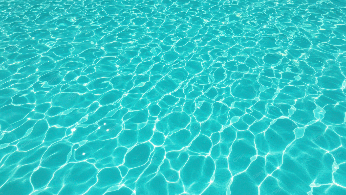 Clear Blue Pool Water with Sunlight Reflections