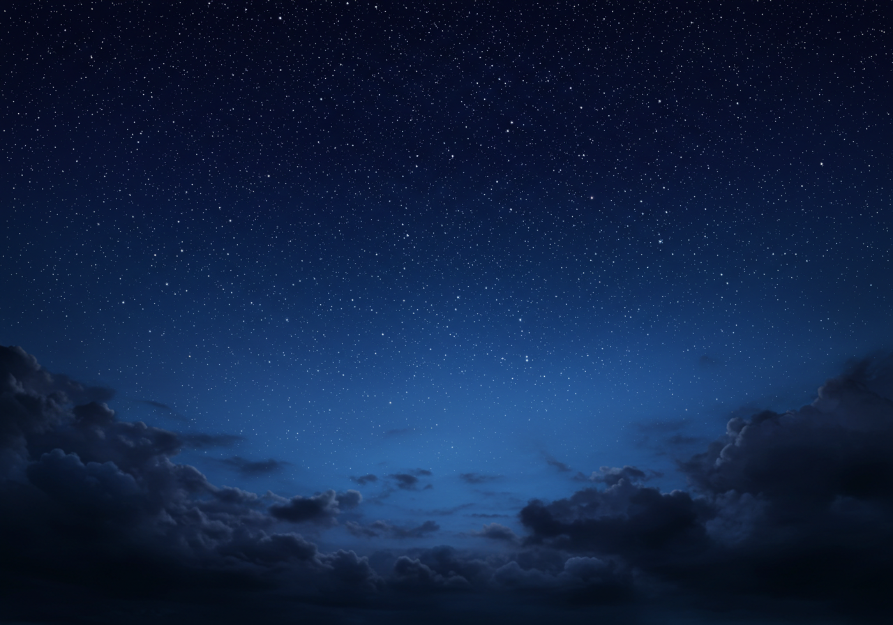 Starry Night Sky Above Dark Clouds