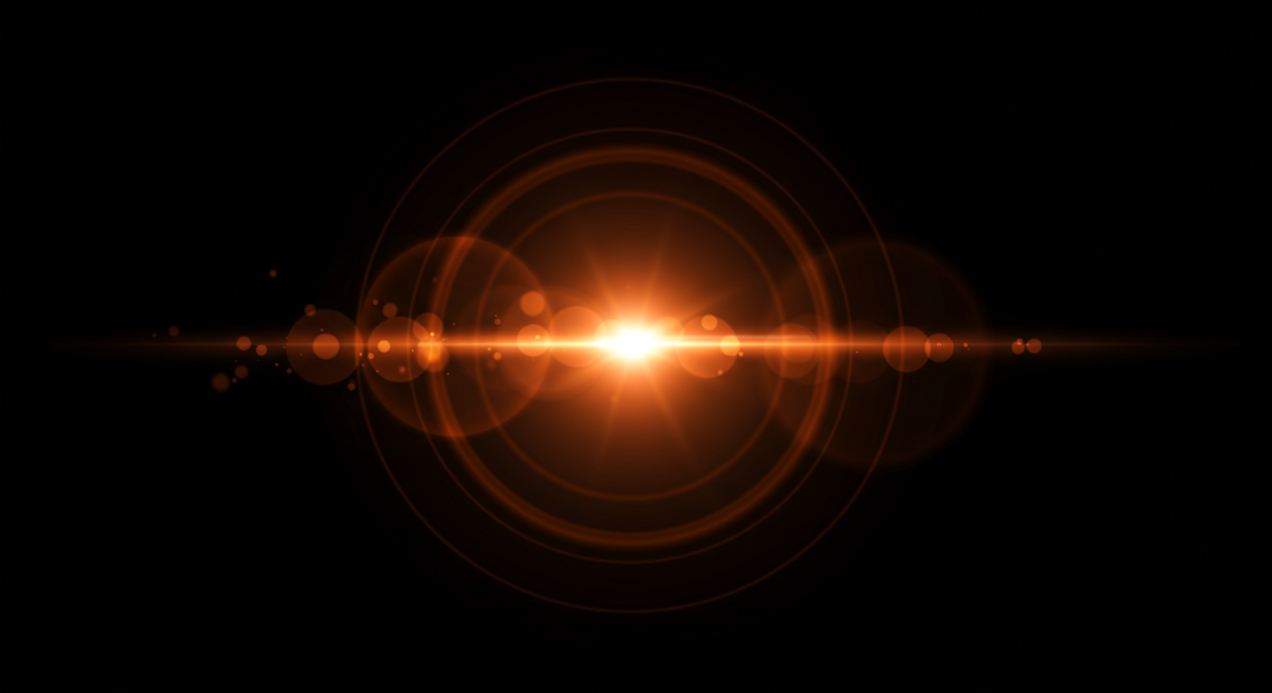 Glowing Orange Lens Flare on Black Background