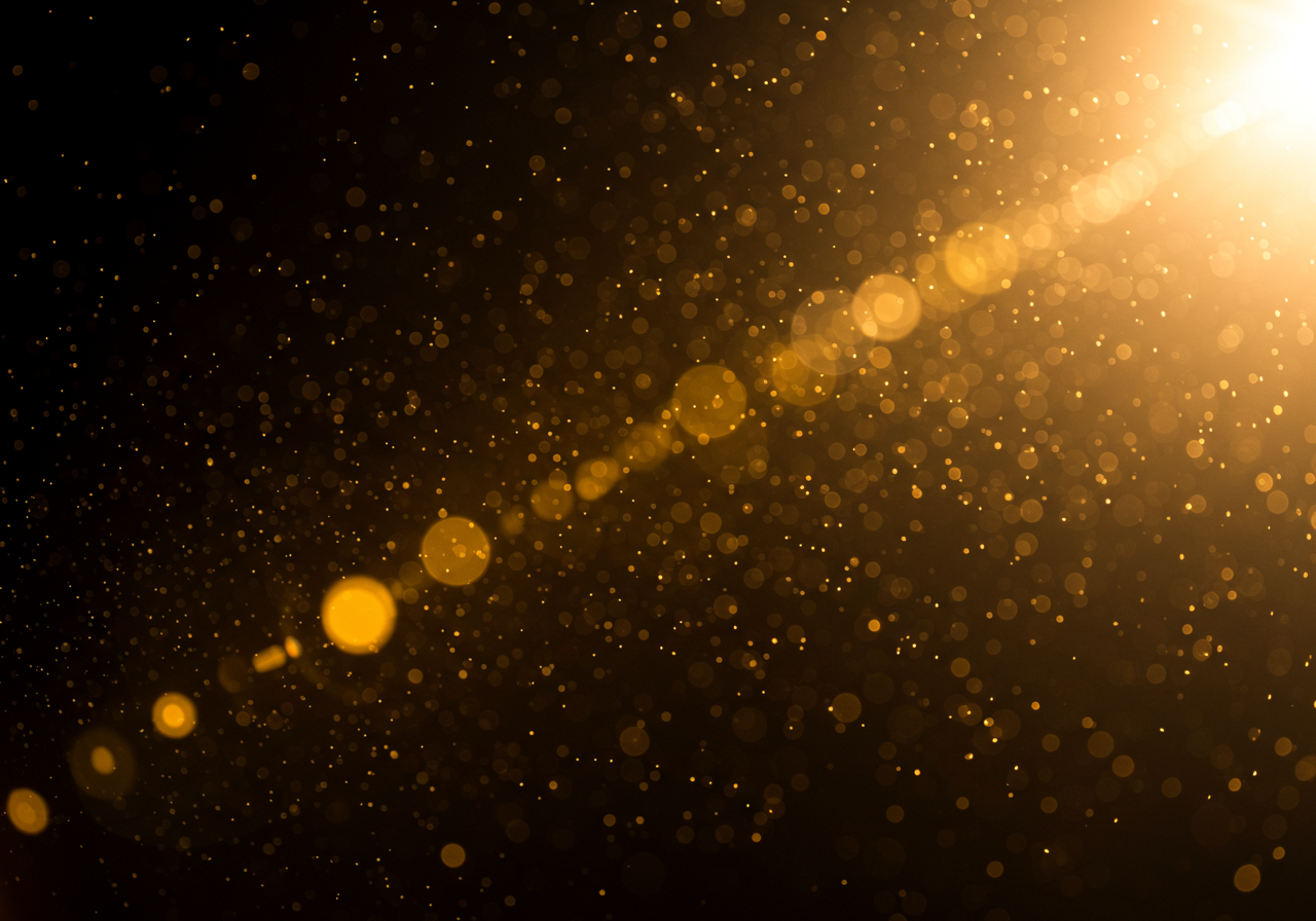 Golden Dust Particles in Sunlight Beam