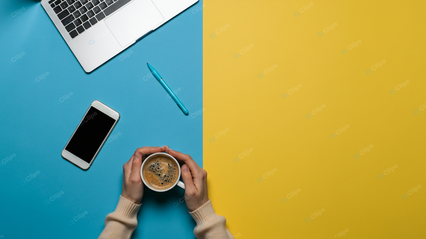 Laptop Workspace with Coffee, Smartphone, and Pen on Colorful Background