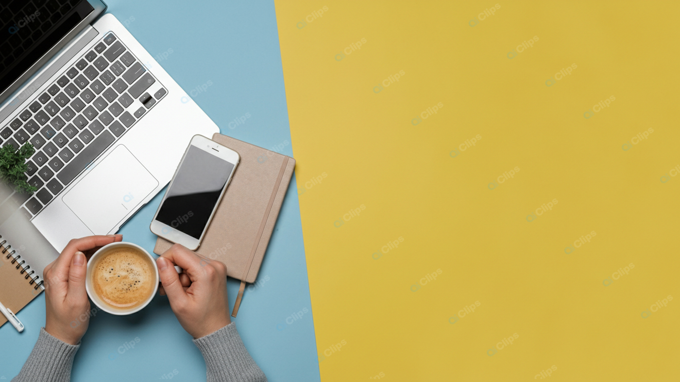 Top View Workspace with Laptop, Smartphone, and Coffee Cup