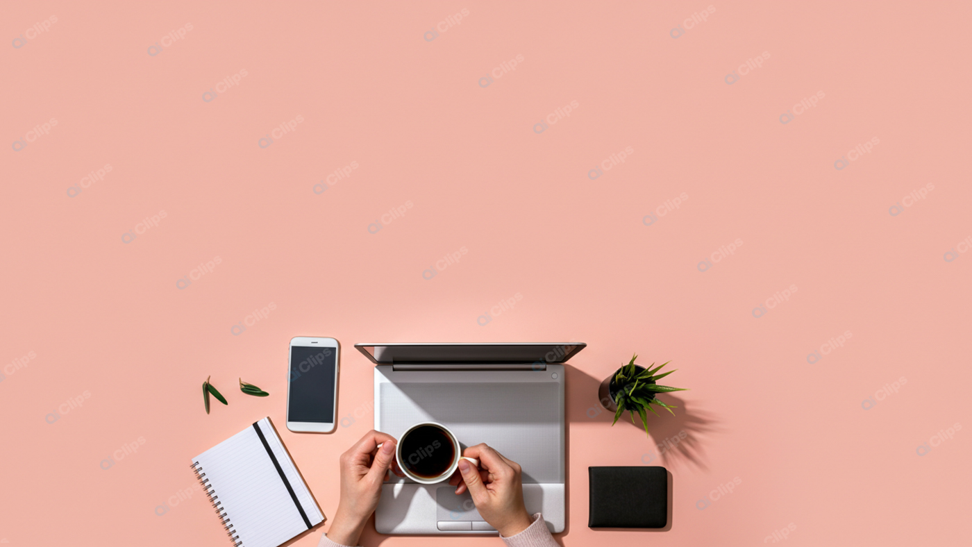 Workspace Flat Lay with Laptop, Coffee, Smartphone, and Notebook on Pink Background