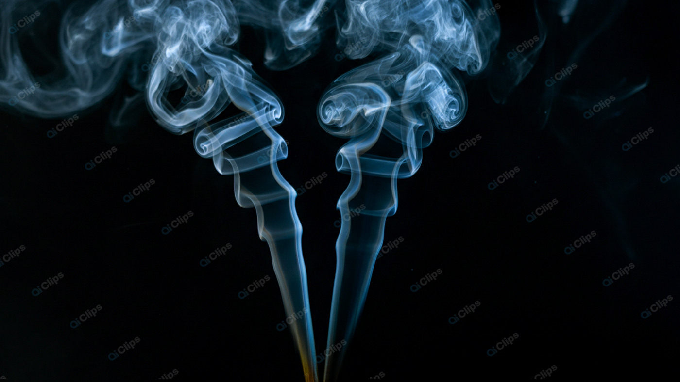 Mystical Blue Smoke Swirls Against a Black Background
