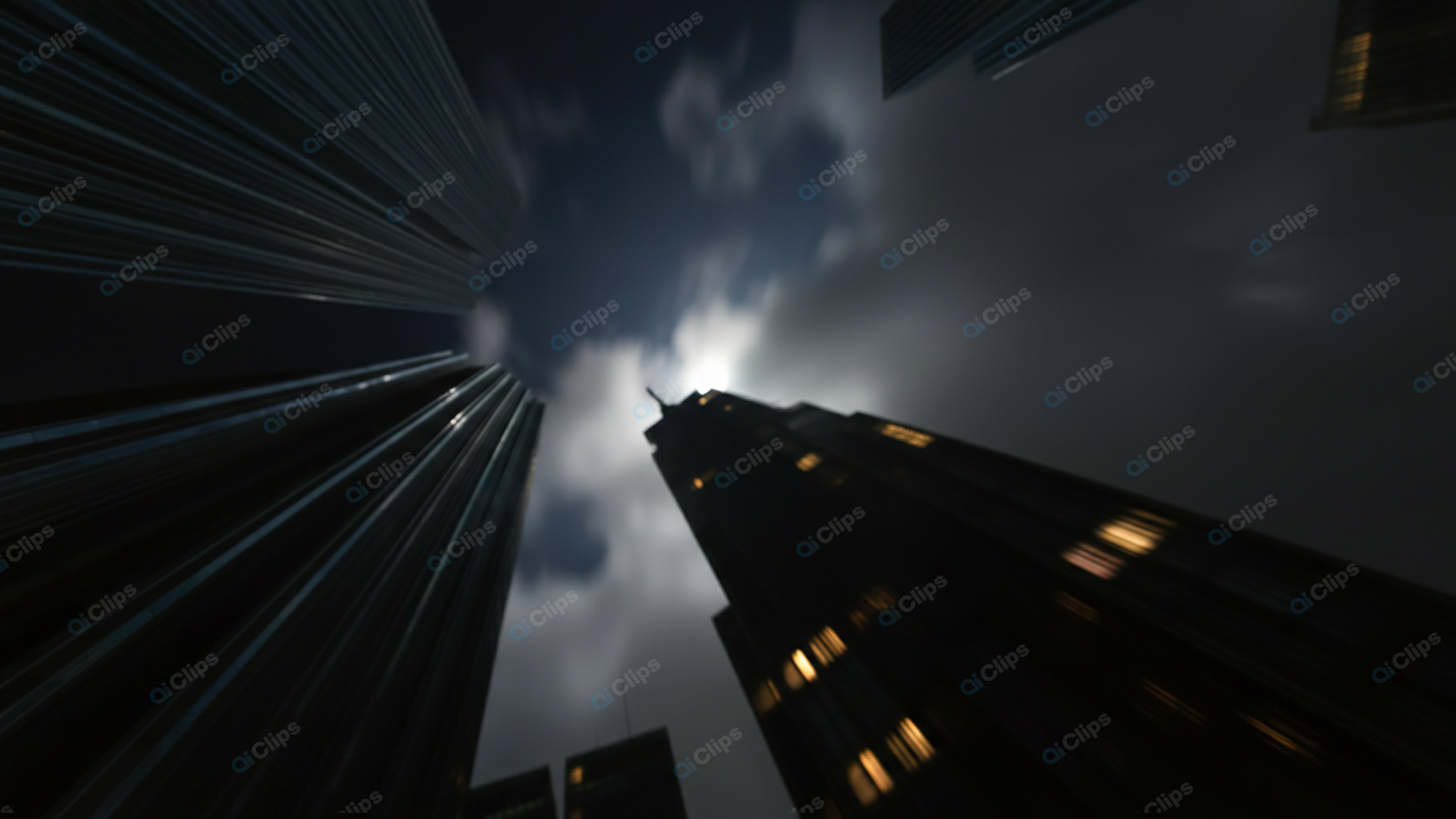 Nighttime Skyscraper Silhouette with Cloudy Sky