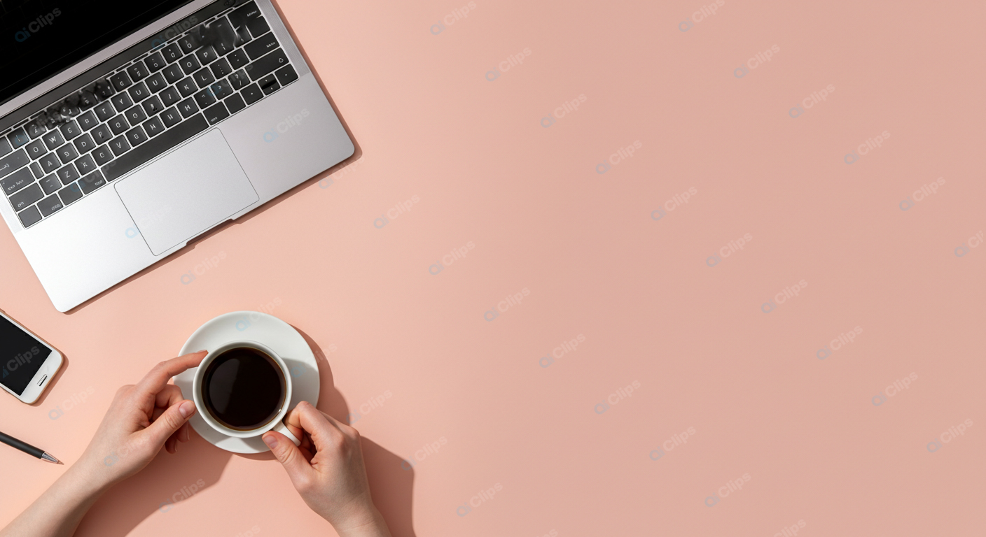 Laptop and Coffee Workspace on Peach Background