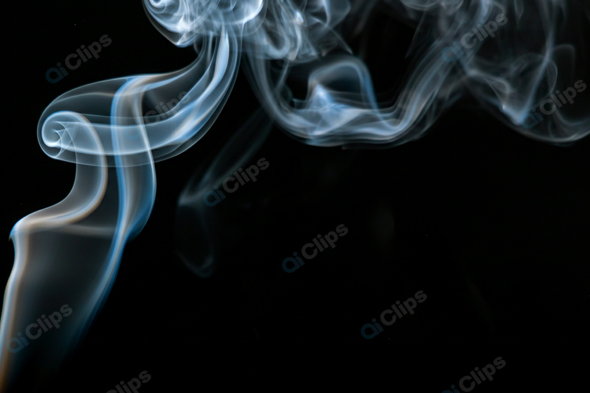 Mystical Smoke Twists on a Black Background
