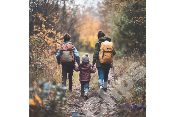 Family Hiking in Autumn Forest